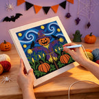 Punching the Starry Pumpkin Patch Scarecrow design with the punch needle