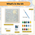What is in the Starry Skeleton Duo kit: printed canvas, punch needle, threader, threads, color guide and hangers