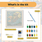 What is in the Starry Witch and Cat kit: printed canvas, punch needle, threader, threads, color guide and hangers