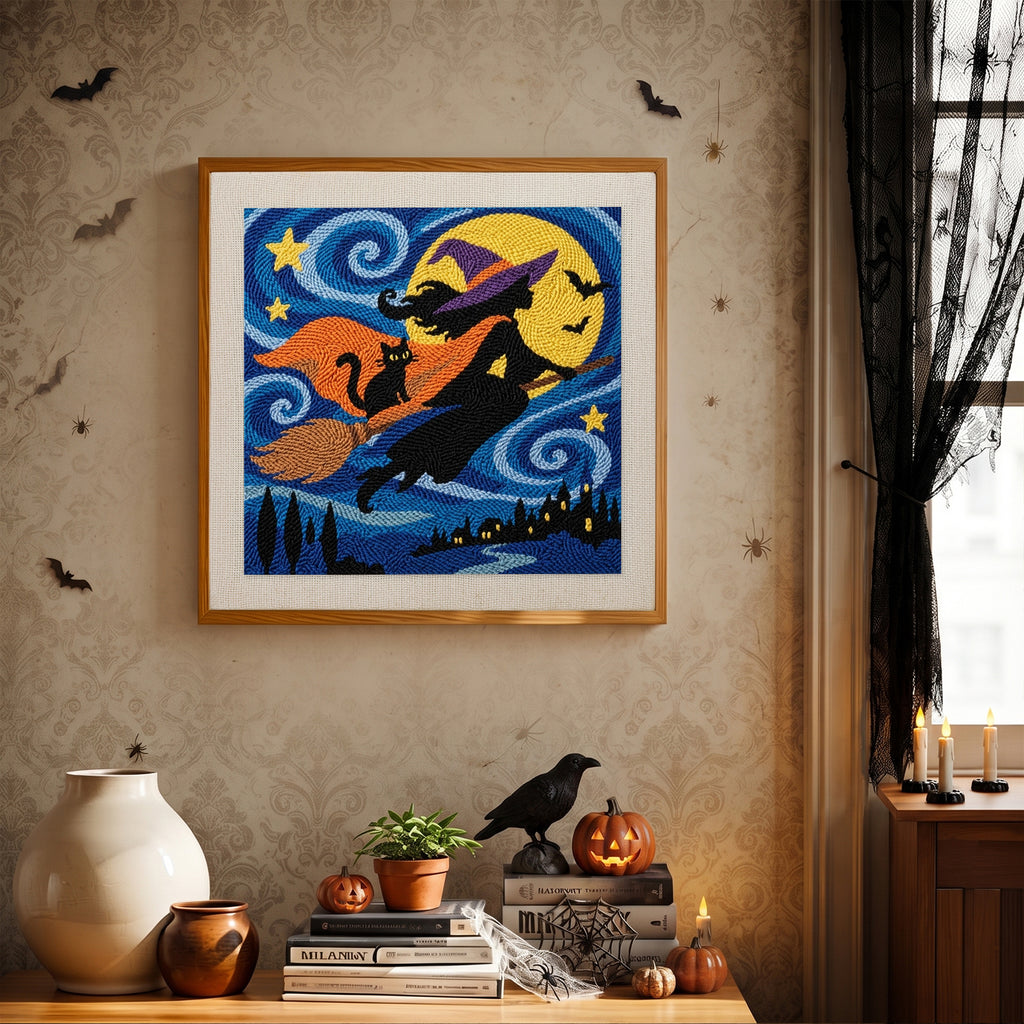 Finished Starry Witch and Cat punch needle canvas on a wall