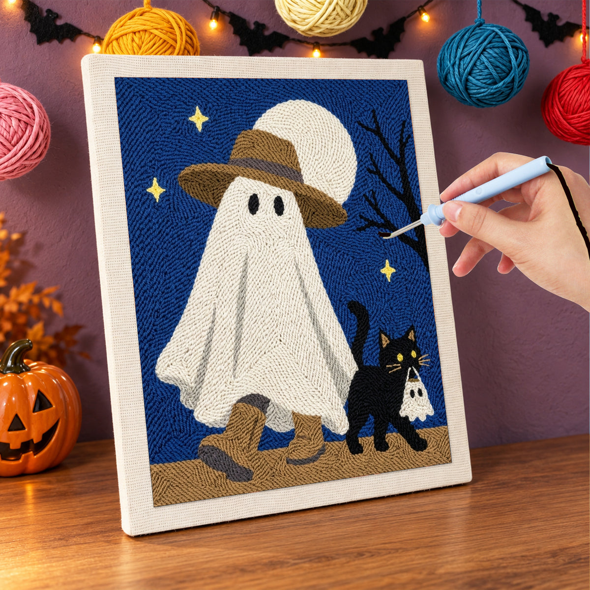 Punching the Straw Hat Ghost design with the punch needle