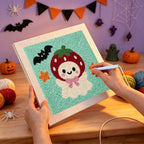 Punching the Strawberry Ghost design with the punch needle