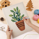 Punching the Striped Pot Plant design with the punch needle
