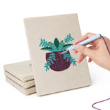 Hand punching one of the Succulent Shelf mini canvases
