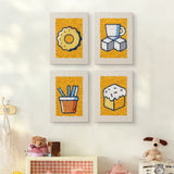 The four Sugar Cube Donut mini canvases on a wall above a shelf