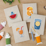 The four finished Summer Coolers mini canvases laid out on a table