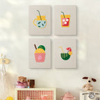 The four Summer Sips mini canvases on a wall above a shelf