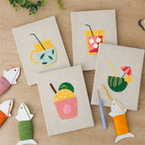 The four finished Summer Sips mini canvases laid out on a table