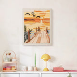Finished Sundown Pier punch needle canvas on a wall