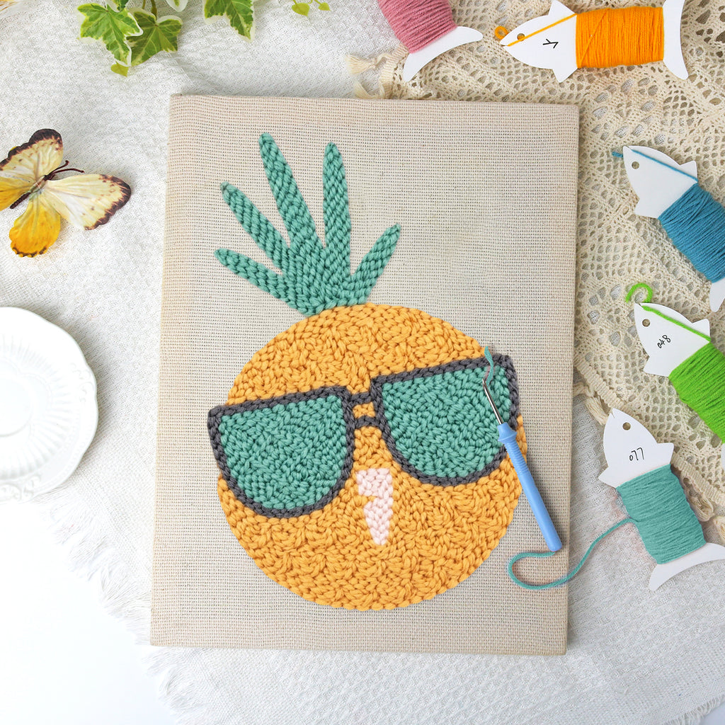 Sunglasses Pineapple canvas before and after punching, with the threads and tools