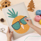 Punching the Sunglasses Pineapple design with the punch needle