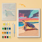 Sunset Sea Turtle canvas before and after punching, with the threads and tools
