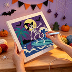 Punching the Surfing Skeleton Witch design with the punch needle
