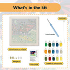 What is in the Surfing Vampire kit: printed canvas, punch needle, threader, threads, color guide and hangers
