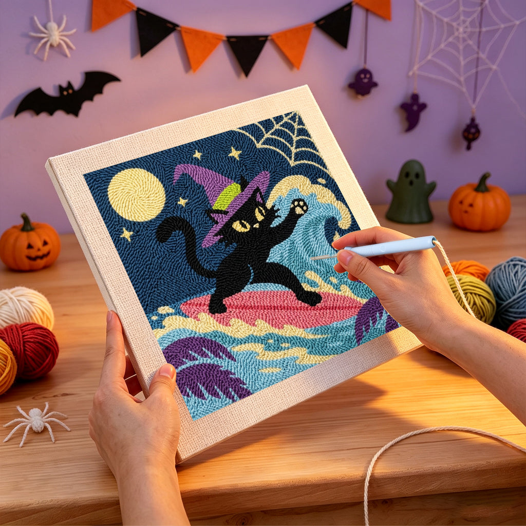 Punching the Surfing Witch Cat design with the punch needle