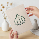 Hand holding a finished Sweet Corn Harvest mini canvas
