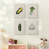 The four Sweet Corn Harvest mini canvases on a wall above a shelf