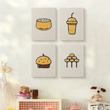 The four Sweet Dango Treats mini canvases on a wall above a shelf