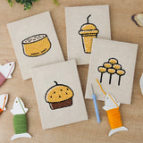 The four finished Sweet Dango Treats mini canvases laid out on a table