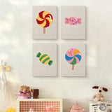 The four Swirl Lollipops mini canvases on a wall above a shelf