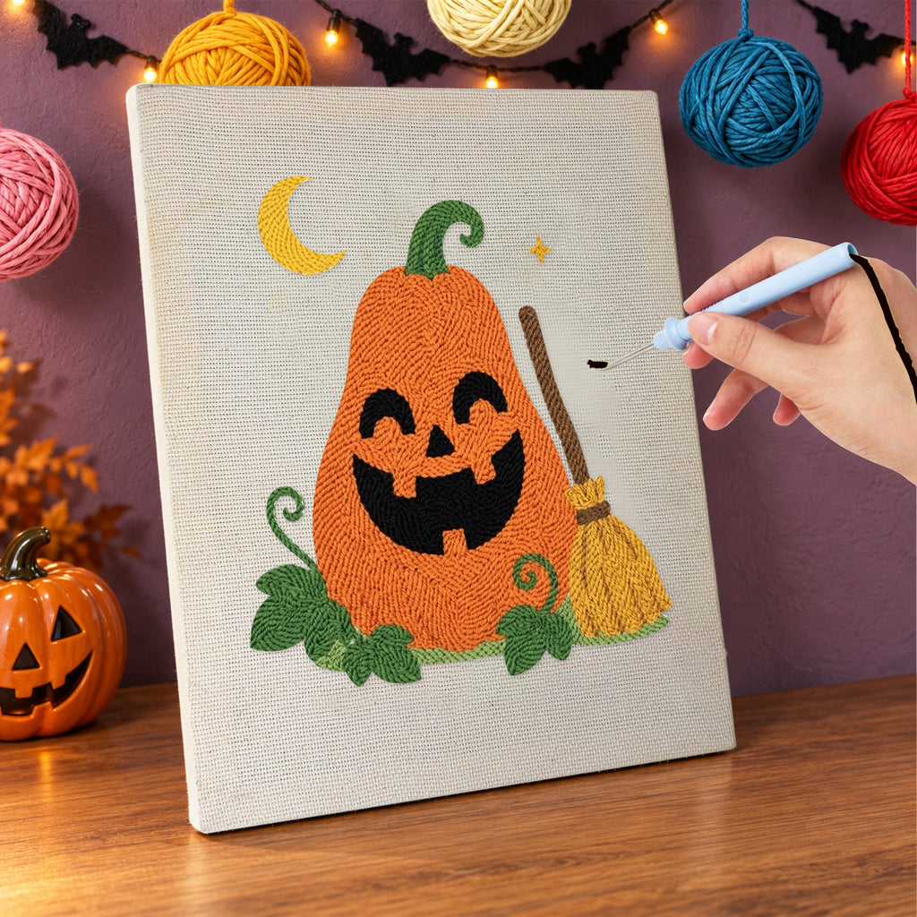 Punching the Tall Pumpkin and Broom design with the punch needle