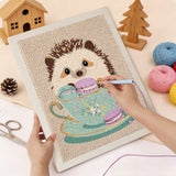 Punching the Teacup Hedgehog design with the punch needle