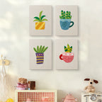 The four Teacup Succulents mini canvases on a wall above a shelf