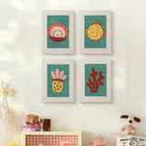 The four Teal Coral Reef mini canvases on a wall above a shelf