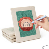 Hand punching one of the Teal Coral Reef mini canvases