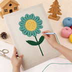 Punching the Teal Daisy design with the punch needle