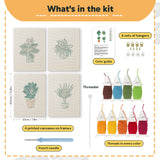 What is in the Teal Pot Greens set, 8 × 12 in (20 × 30 cm) each: 4 printed canvases, punch needle, threader, threads, color guide and 4 sets of hangers