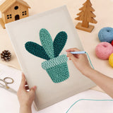 Punching the Teal Pot Leaves design with the punch needle
