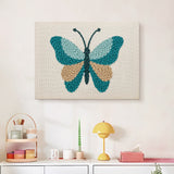Finished Teal Sand Butterfly punch needle canvas on a wall