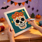 Punching the Teal Sugar Skull design with the punch needle