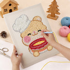 Punching the Teddy Bear Chef design with the punch needle