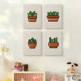 The four Terracotta Succulents mini canvases on a wall above a shelf