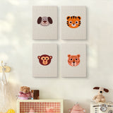 The four Tiger Cub Faces mini canvases on a wall above a shelf