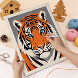 Punching the Tiger Face design with the punch needle