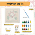 What is in the Toadstool Ghost kit: printed canvas, punch needle, threader, threads, color guide and hangers