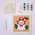 Toadstool Ghost canvas before and after punching, with the threads and tools