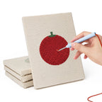 Hand punching one of the Tomato and Broccoli mini canvases