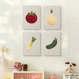 The four Tomato and Leek mini canvases on a wall above a shelf