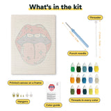 What is in the Tongue Out Lips kit: printed canvas, punch needle, threader, threads, color guide and hangers