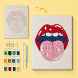 Tongue Out Lips canvas before and after punching, with the threads and tools