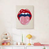 Finished Tongue Out Lips punch needle canvas on a wall