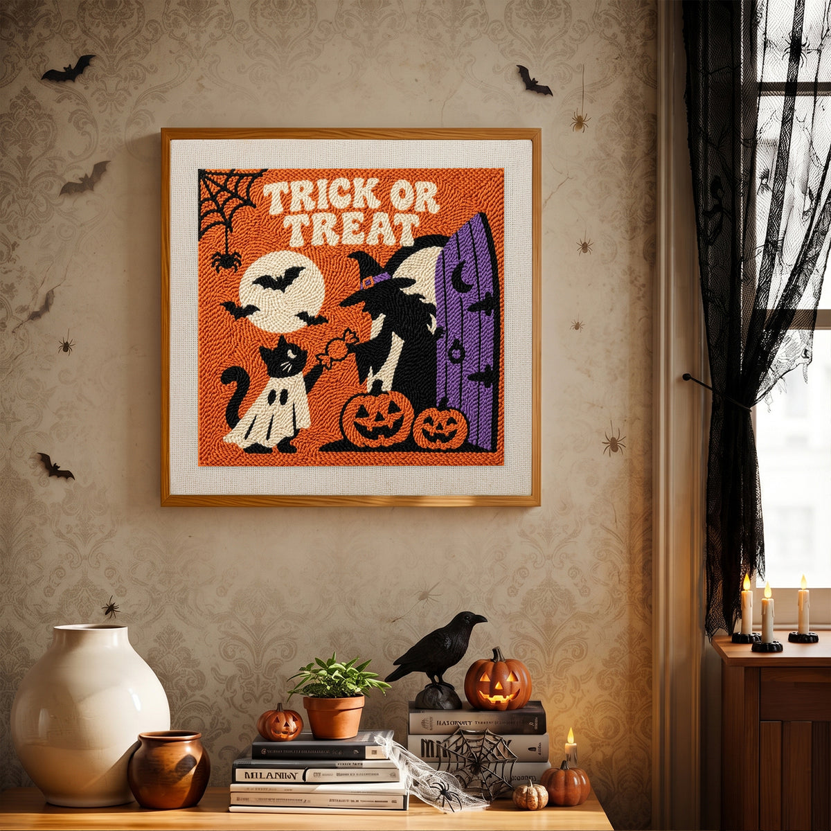 Finished Trick or Treat Doorstep punch needle canvas on a wall