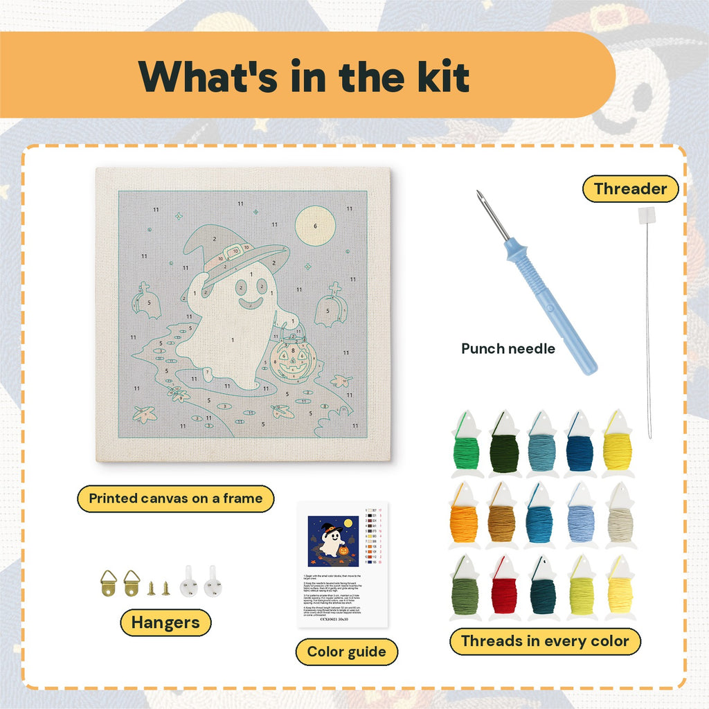 What is in the Trick-or-Treat Ghost kit: printed canvas, punch needle, threader, threads, color guide and hangers