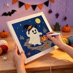 Punching the Trick-or-Treat Ghost design with the punch needle