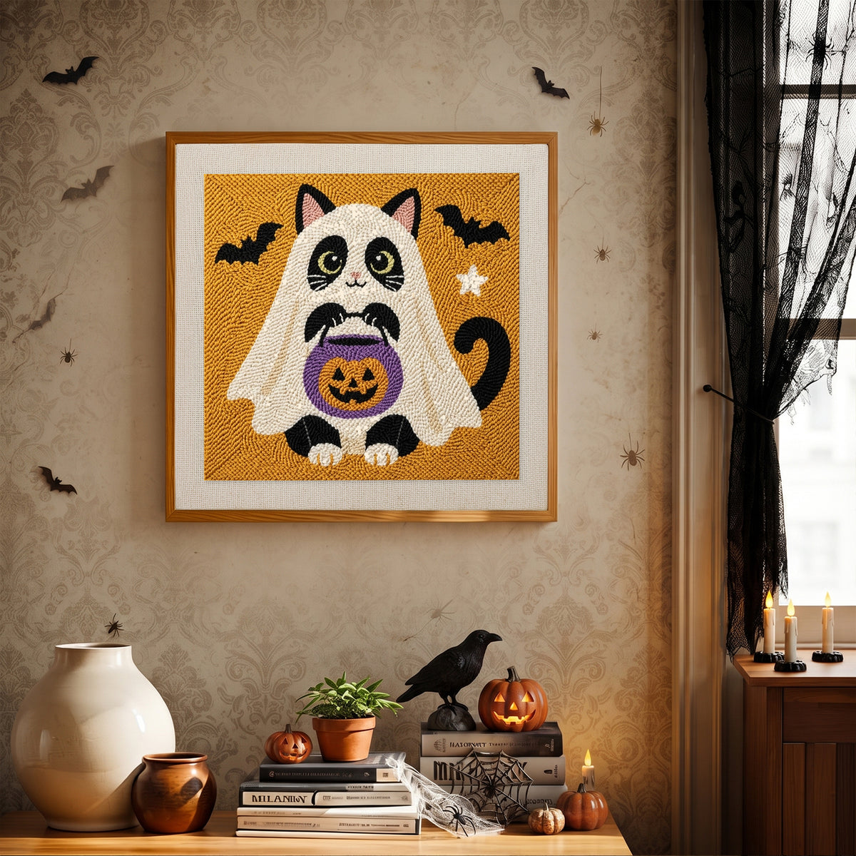 Finished Tuxedo Cat Ghost punch needle canvas on a wall