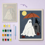 Umbrella Ghost and Cat canvas before and after punching, with the threads and tools